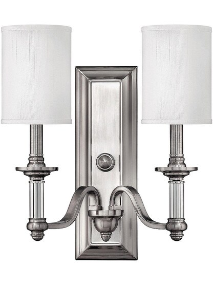Sussex Double Sconce with White Fabric Cylinder Shades in Brushed Nickel.